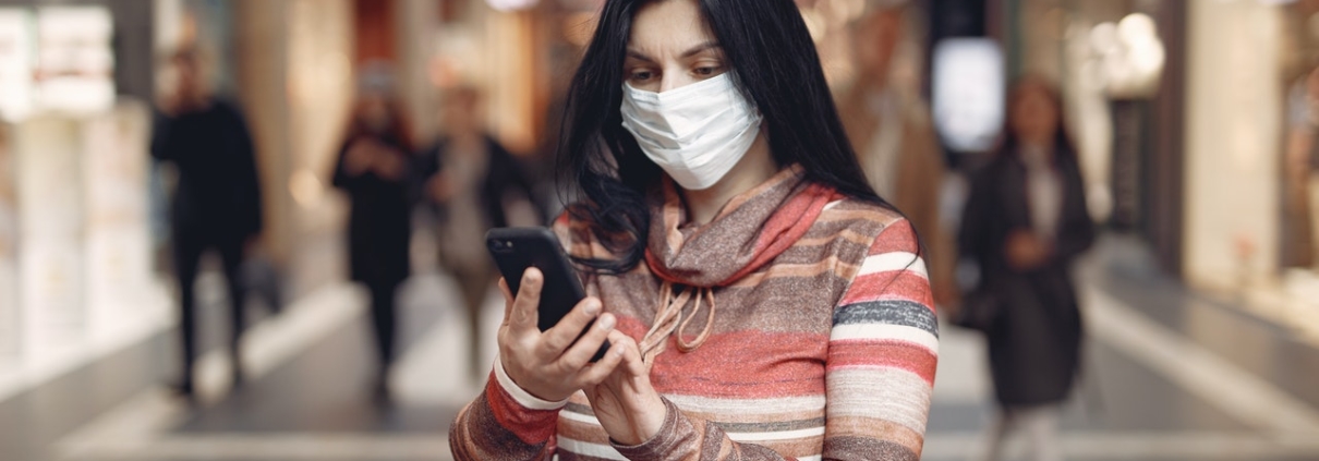 Woman with Mask and phone